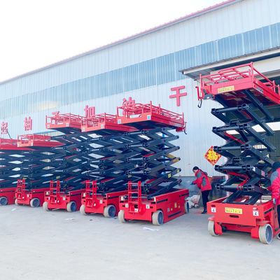 Piattaforma mobile di sollevamento con forbice elettrica di estensione di 900 mm per caricatori con un peso di 2000 kg di lavoro
